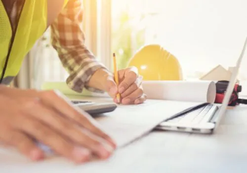 Civil Engineering Worker Planning on Paper in Chattanooga TN