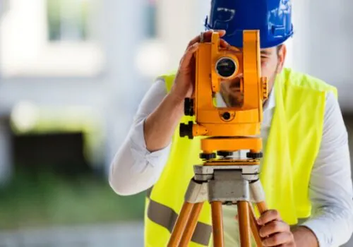 ALTA Surveys being conducted by worker in Illinois