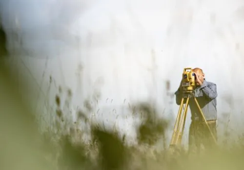 A surveyor performing Property Surveys in IL