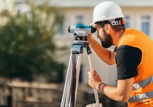 A professional surveyor performing Residential Surveys in Springfield IL