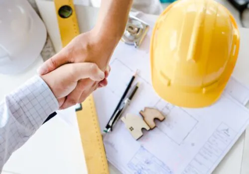 An engineer and architect shake hands over Residential Site Planning in Springfield IL