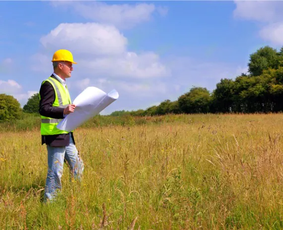 Land Development Firm Nashville TN 1 A Land Development Firm for Nashville TN studying a piece of land in preparation for site planning