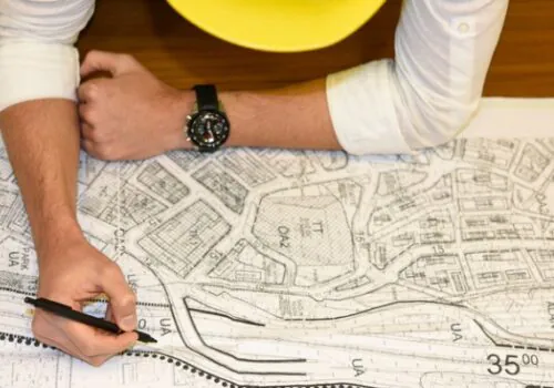 An engineer from a Civil Engineering Firm, hard at work on a site plan for a residential subdivision