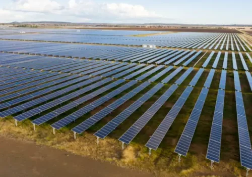 Solar panels spread out across a farm after Austin Engineering performs Solar Farm Surveys in Davenport IA