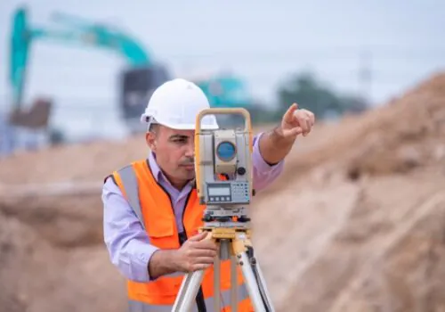 A team member of Austin Engineering provides Commercial Surveys in Rock Island IL