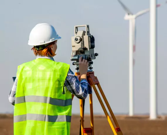 Surveyor conducting ALTA Surveys in the Quad Cities